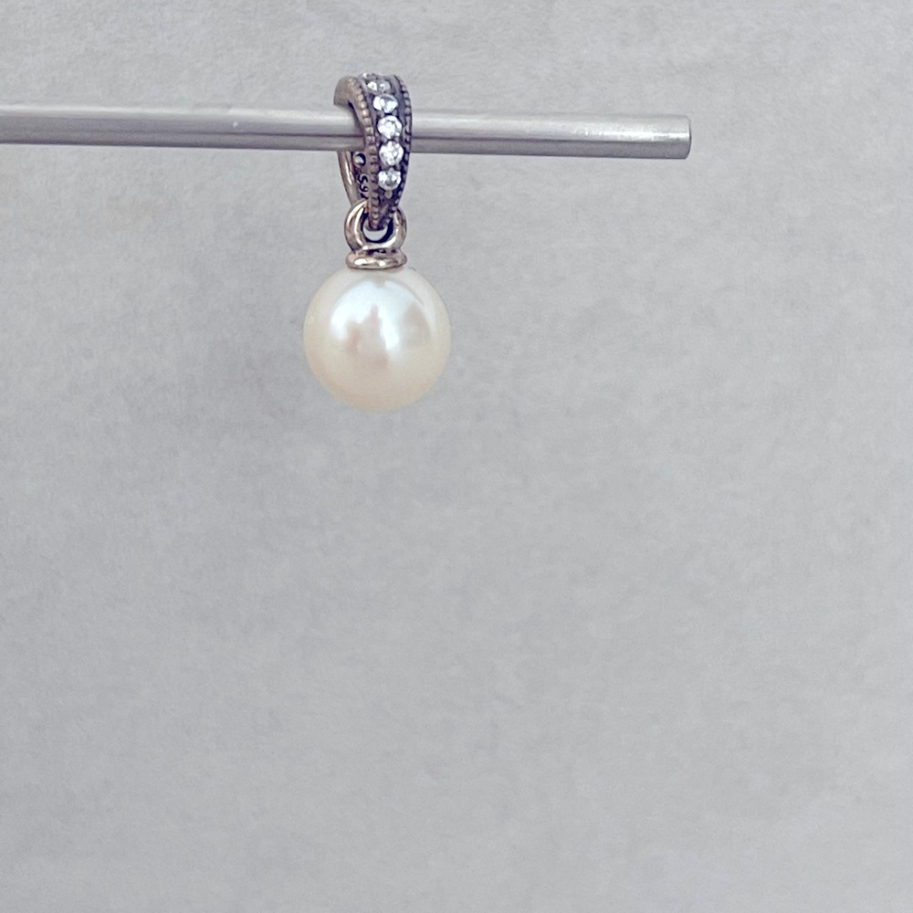 Dangling silver NEW charm with Pearl and CZ.
